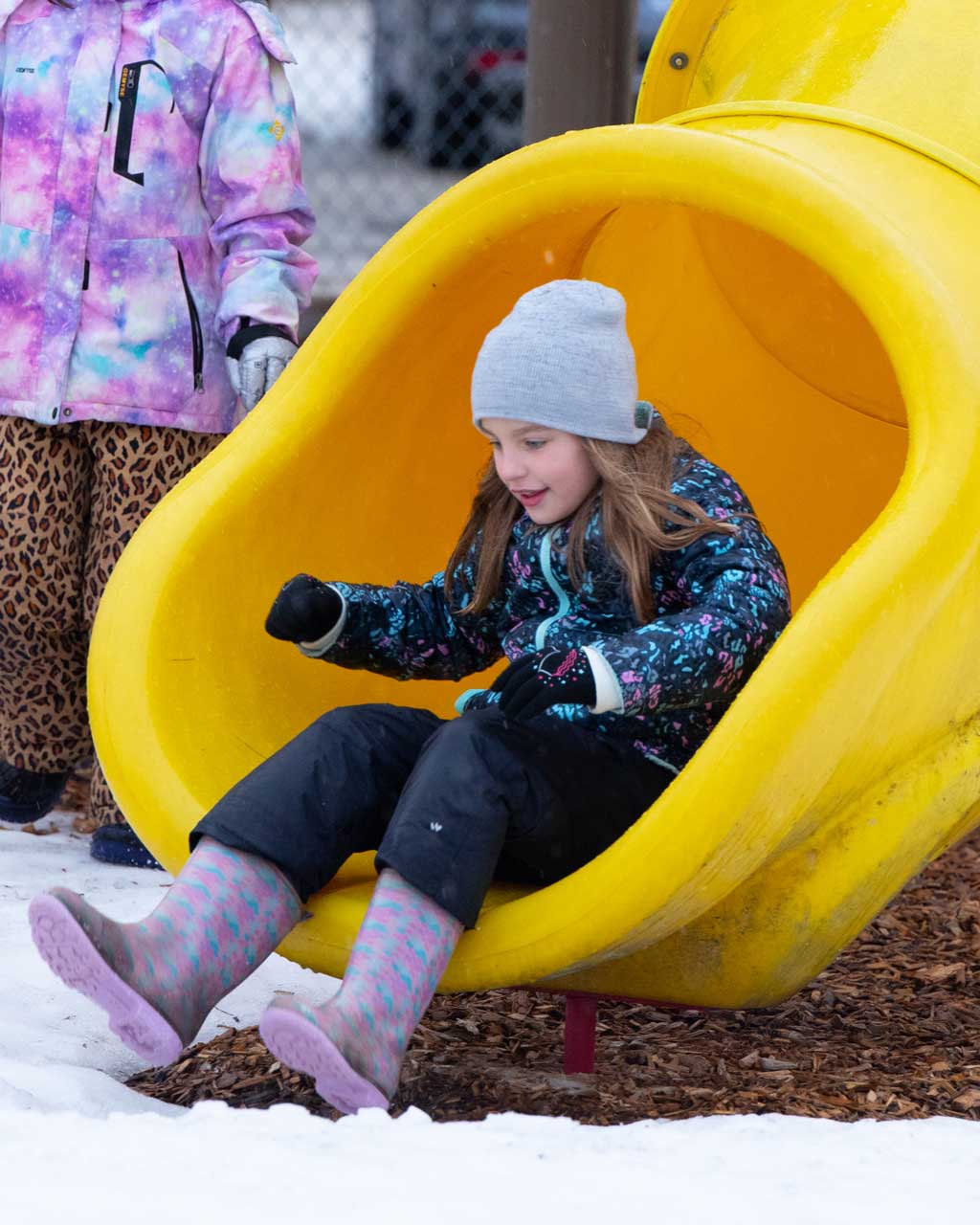 girl-on-slide-portrait